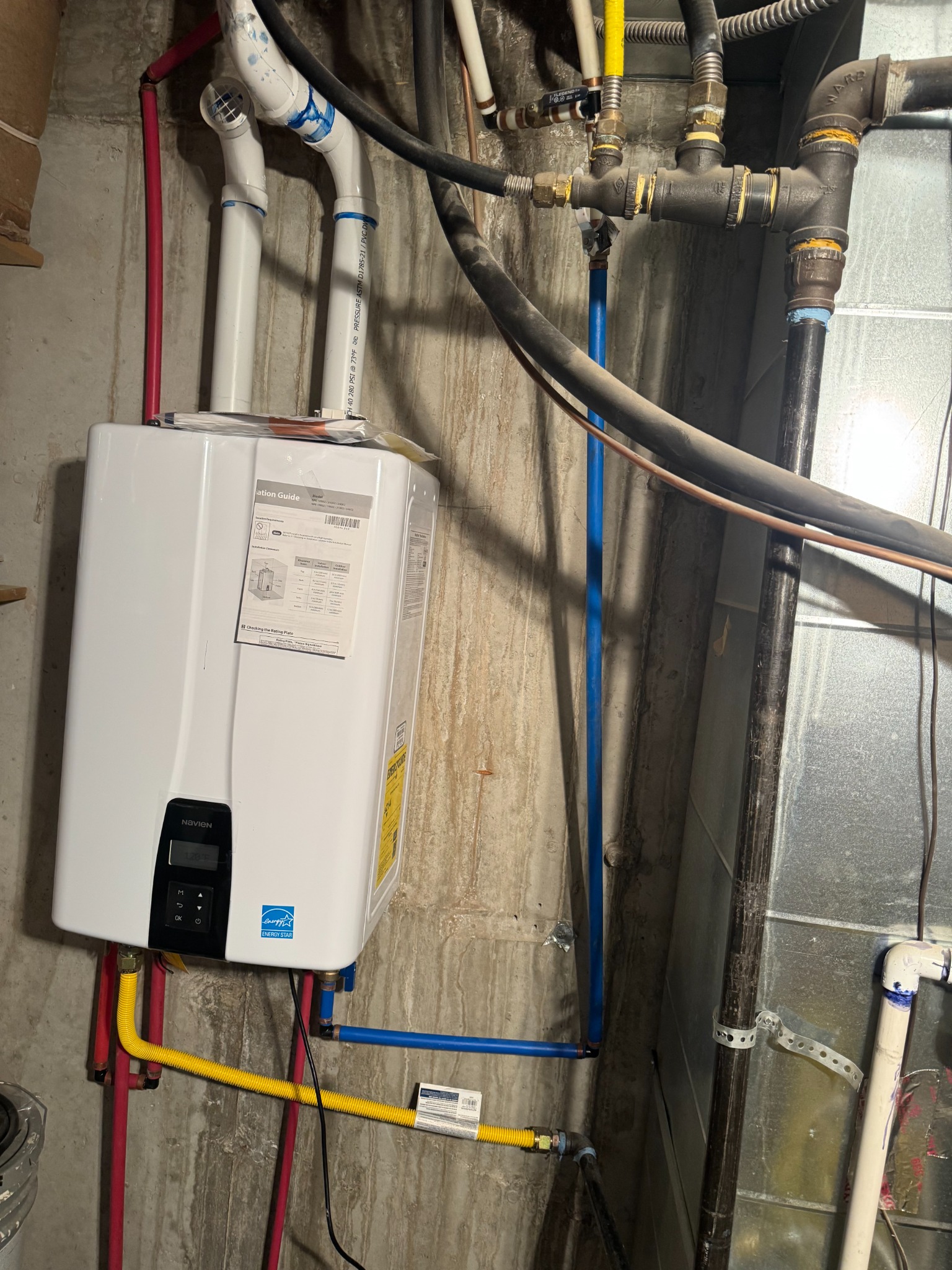 Tankless water heater and pump installation